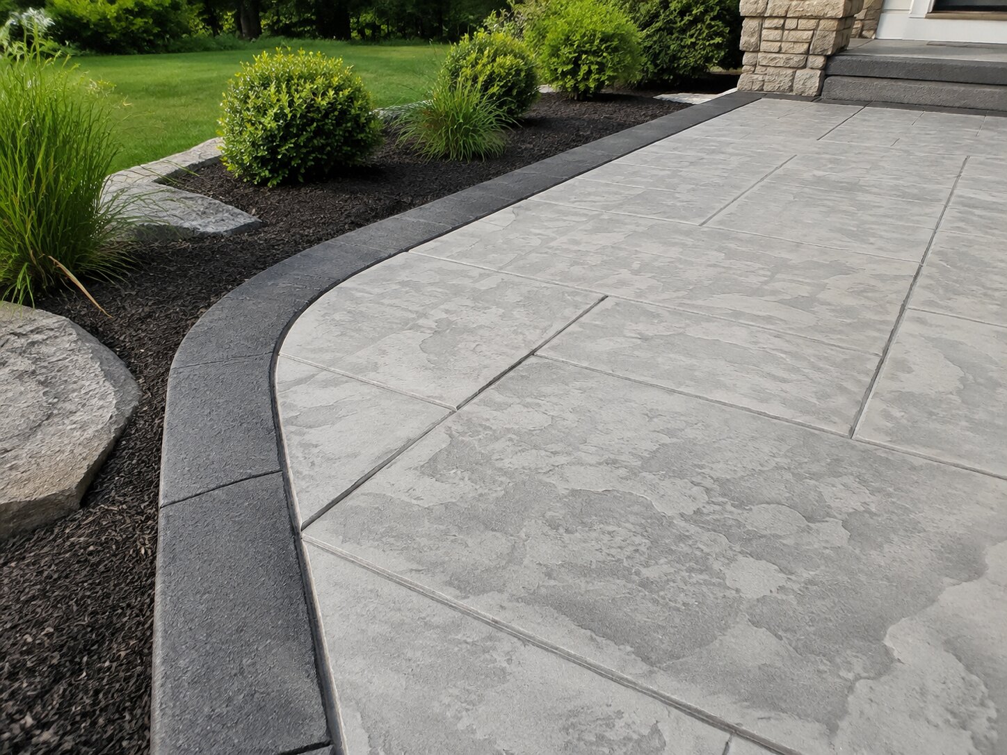Stamped concrete surface with a dark accent border